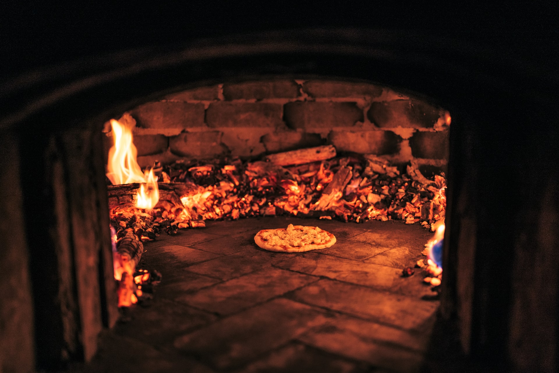 Traditional Italian Pizza Oven in Action
